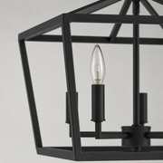 Texture | marnau Lampaul 4-Light Lantern Chandelier close view of its matte black steel bars and candle socket