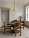 Scale | marnau Lannic 8-Light Empire Chandelier beside a full-height dining-room doorway for scale