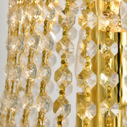 Texture | close view of the Lannic chandelier faceted crystal bead strands and gold supports
