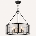 Hardware | close view of the chandelier's black chain, round canopy, and suspension rod attachments