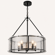 Hardware | close view of the chandelier's black chain, round canopy, and suspension rod attachments