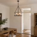 Scale | chandelier hanging beside an uncropped full-height doorway for scale