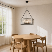 Angle | three-quarter dining-room view of the chandelier over the pale-oak table