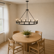 Angle | closer view across the table toward the lit chandelier