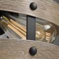 Hardware detail | Graphite bracket, round fasteners, embossed wood grain, and bulb glass