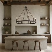 Beamed kitchen | oil-rubbed bronze chandelier above a stone island