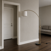 In scale | full floor lamp beside an uncropped floor-to-ceiling doorway