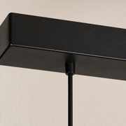 Hardware close detail | black canopy attachment with a straight suspension cord