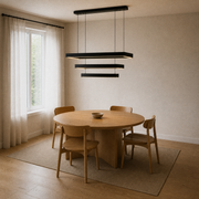 Warm dining corner view | black three-tier rectangular LED chandelier over an oak table from a corner view