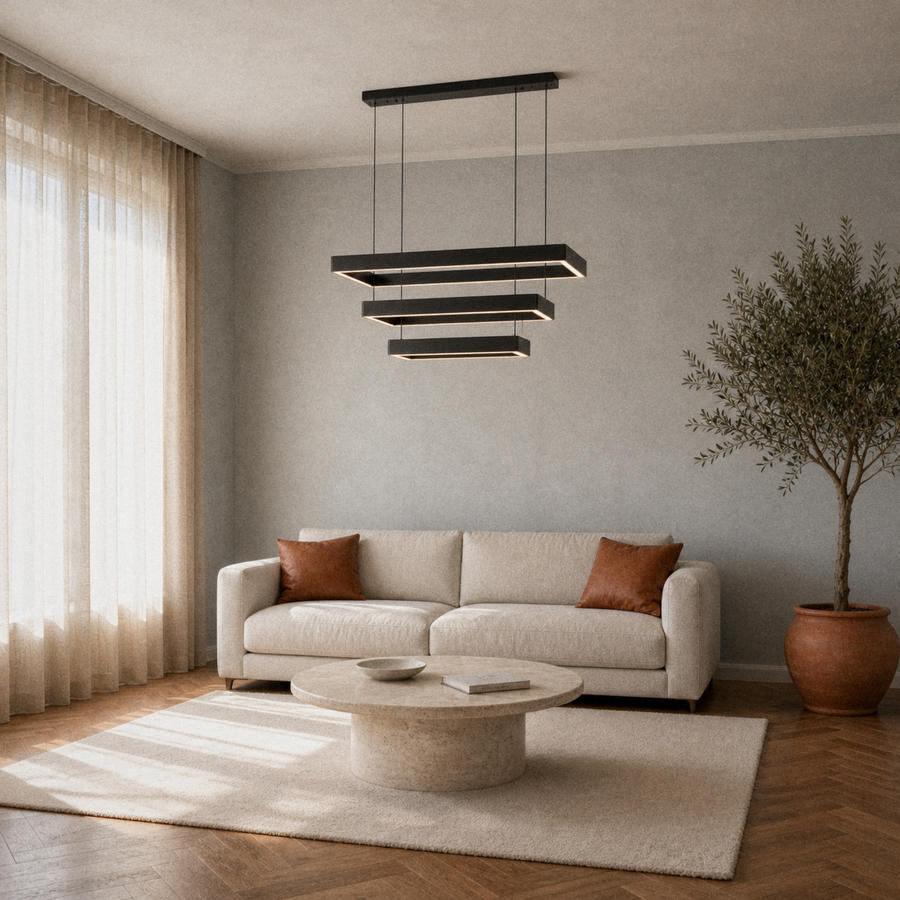 Cool limewash living room view | black three-tier rectangular LED chandelier above a travertine coffee table