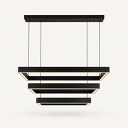 Studio front | black aluminum chandelier with three stepped rectangular LED frames, four cords, and slim canopy