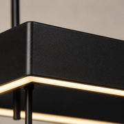 Close detail | textured black aluminum frame and warm LED edge