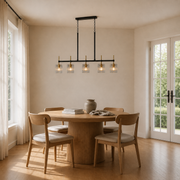 Scale | uncropped dining room showing true hang height beside a full-height window