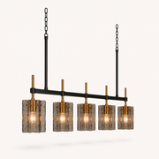 Studio | three-quarter angle showing all five smoky glass shades and the brass stems