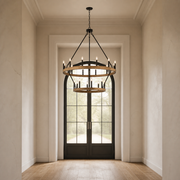 Scale | light woodgrain 20-light chandelier hanging within a full-height entry doorway