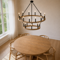 Room | three-quarter view of the light woodgrain two-tier chandelier over a dining table with a window at left