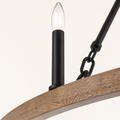 Close detail | light woodgrain ring texture with black socket, chain links, and candle bulb