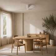 In a room | matte white three-blade LED ceiling fan mounted over a pale oak dining table