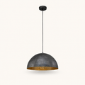 Front | studio front of the black textured dome, gold interior, and black cord