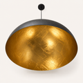 Underside | looking up into the gold-leaf interior and the bulb glow
