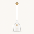 Studio front | single clear glass vase shade, cool-brass rod and round canopy