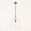 Studio angle | low upward view of the clear vase shade, cool-brass socket, bulb and canopy