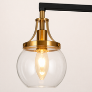 Close view | clear round glass globe, copper-plated cap with two slotted screws, and matte black bar