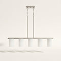 Front | five white frosted glass cylinders on a brushed nickel bar with two chain-and-rod drops