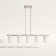 Front | five white frosted glass cylinders on a brushed nickel bar with two chain-and-rod drops