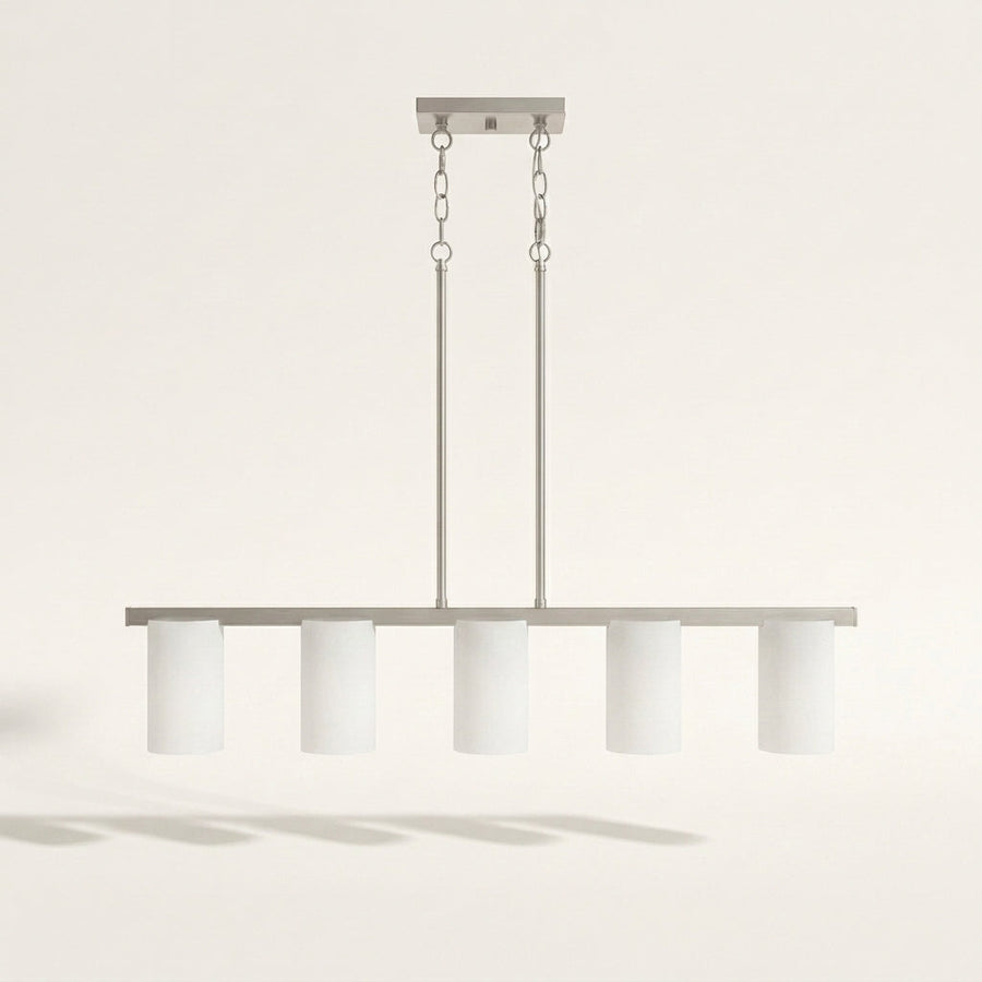 Front | five white frosted glass cylinders on a brushed nickel bar with two chain-and-rod drops