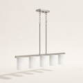 Three-quarter studio | brushed nickel bar, rectangular canopy, two drops, and five frosted shades