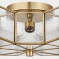 Close detail | round brass canopy, socket hardware, and bottom finial