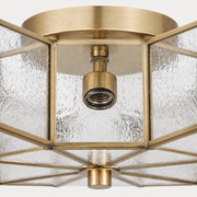 Close detail | round brass canopy, socket hardware, and bottom finial
