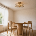 Room angle | low dining-room view of the star flush mount over the table