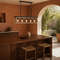 Room | whitewashed wood and graphite-black chandelier over a walnut island in a terracotta kitchen