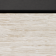 Close up | whitewashed wood rail grain and graphite-black top rail