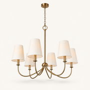Underside angle | six-light warm brass chandelier showing the canopy, chain, hub, and curved arms