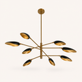 Studio underside angle | eight black-and-gold cone shades, staggered brass arms, central rod and canopy