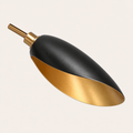 Close-up | matte-black cone shade exterior, light-gold interior and brass collar