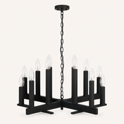 Studio front | dark aged-zinc open X-frame chandelier with twelve upright candle sockets, round canopy and chain