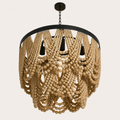 Side | low-angle studio view of the cream wood-bead chandelier showing the black rim, sockets, chain, and bead depth