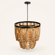 Studio | three-quarter studio view showing the cream bead swags, black rim, inner ring, and chain