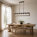 Scale | the chandelier's true size shown above a sofa and stone coffee table, cropped close to the seating area