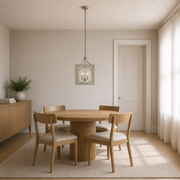 Scale | antique silver lantern pendant over an oak table beside a full-height interior doorway