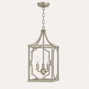 Side | studio side profile of the antique silver open lantern pendant with chain and canopy