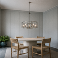 In a room | marnau Sein 5-Light Drum Chandelier in a blue-gray sunroom dining room