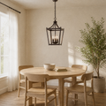 Dining angle | Lower front-right dining-room view of the open lantern pendant