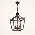 Underside | Low three-quarter studio view showing the open square cage, three candle sockets, and side depth
