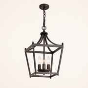 Underside | Low three-quarter studio view showing the open square cage, three candle sockets, and side depth
