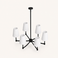 Elevated studio angle | six white fabric drum shades, black arms, hub, canopy, and downrod